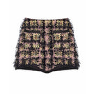 Black textured wool mini skirt by Lalo, showcasing a stylish fitted design with a high waist and textured fabric detail.