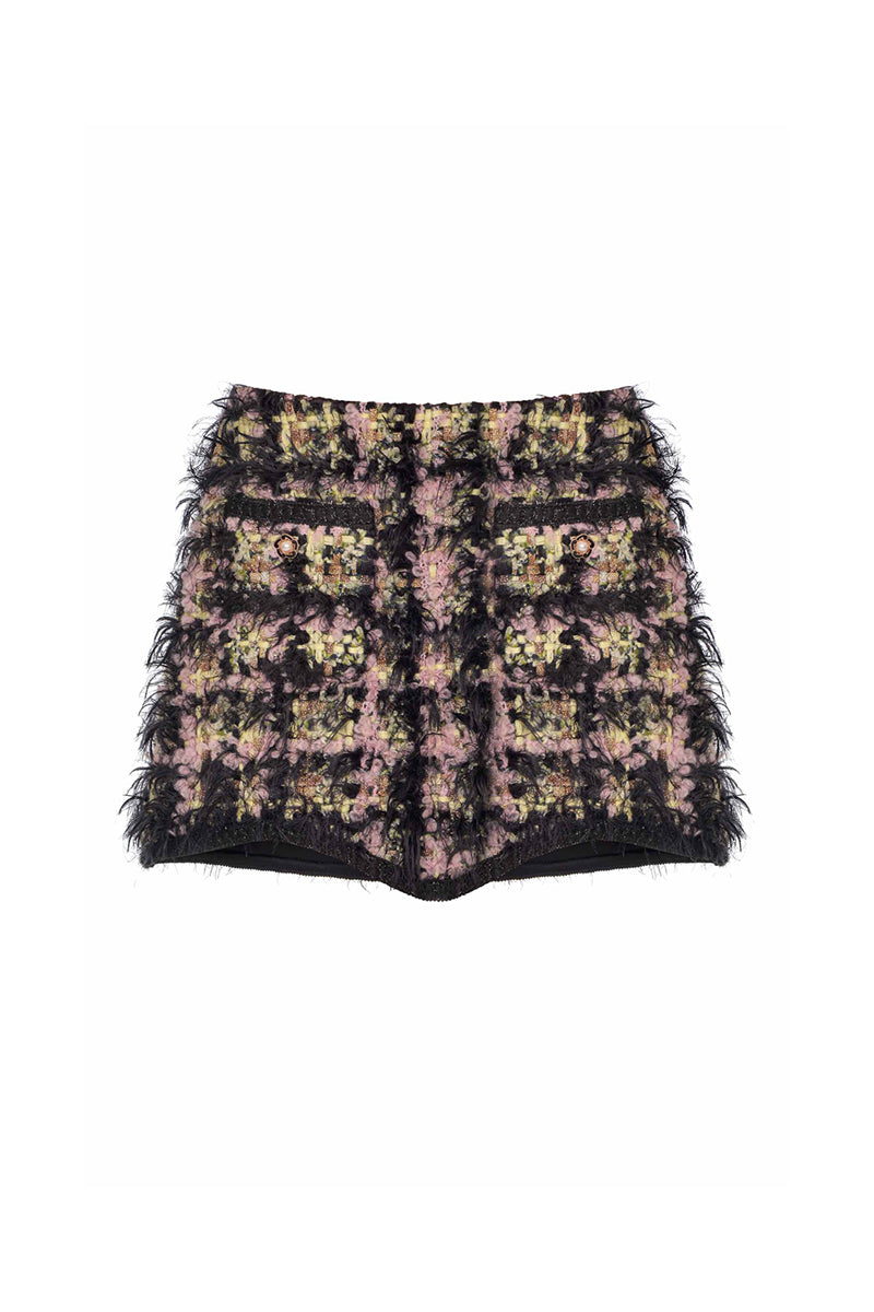 Black textured wool mini skirt by Lalo, showcasing a stylish fitted design with a high waist and textured fabric detail.