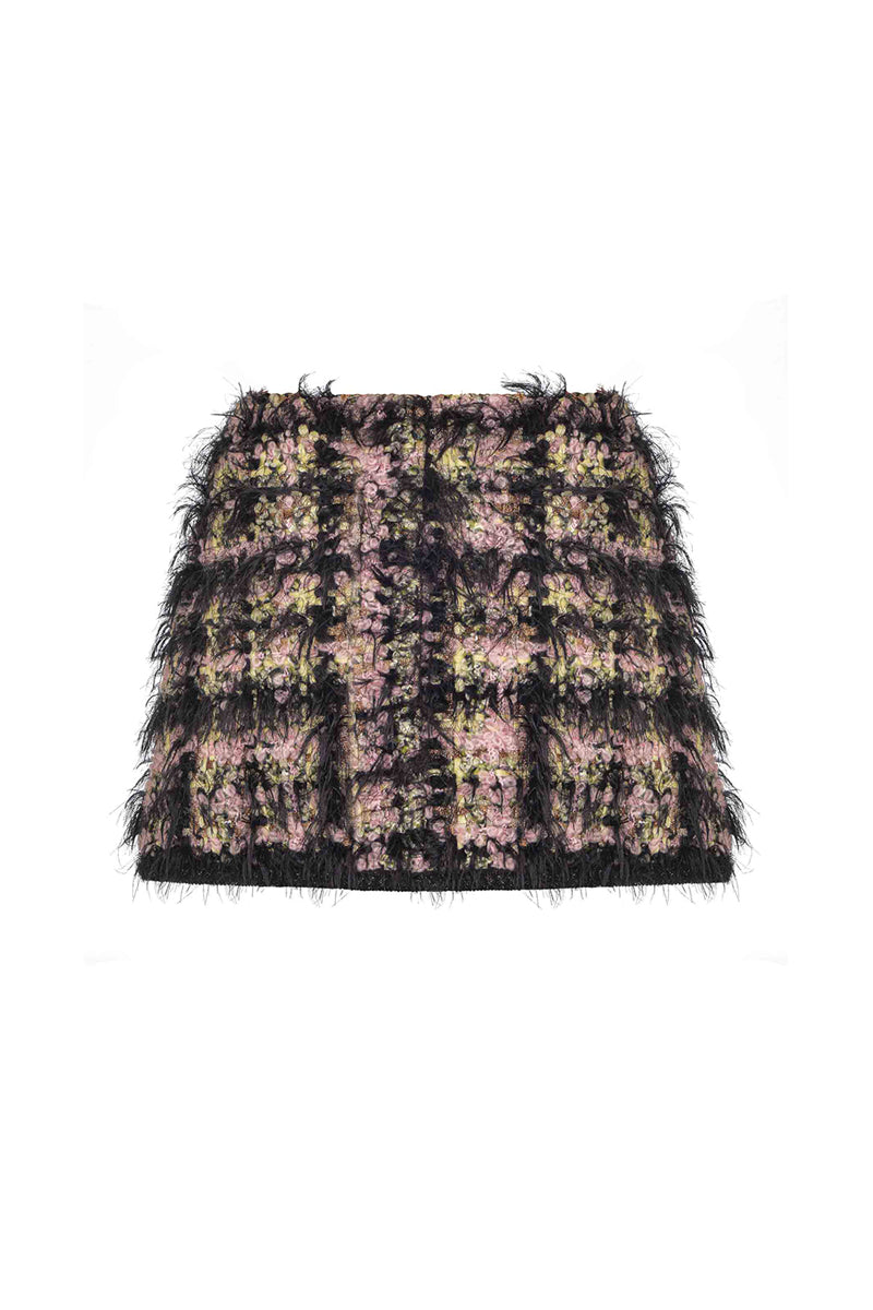 Lalo textured black wool mini skirt displayed on a model, showcasing a stylish and fitted design perfect for fashionable outfits.