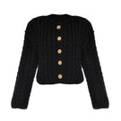 Black cable knit wool cardigan by Lalo, featuring a cozy textured design and button closure, displayed on a neutral background.