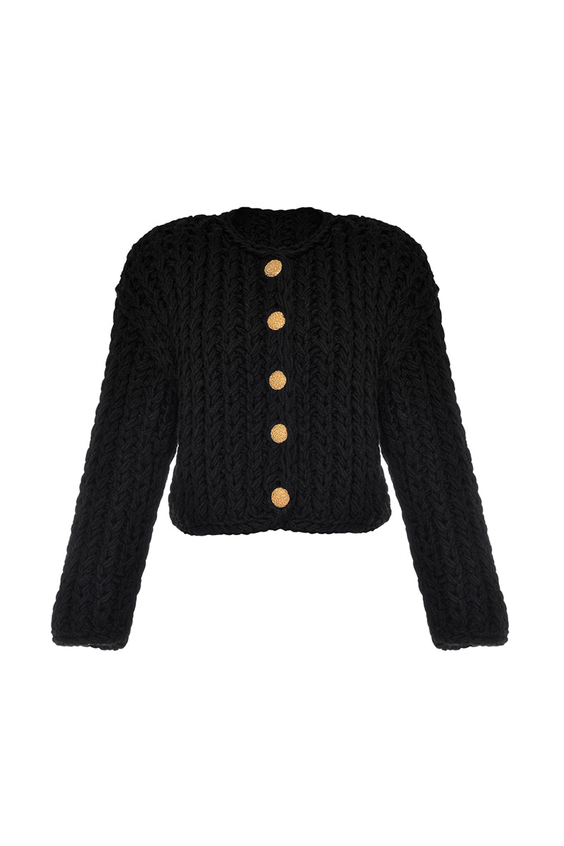 Black cable knit wool cardigan by Lalo, featuring a cozy textured design and button closure, displayed on a neutral background.