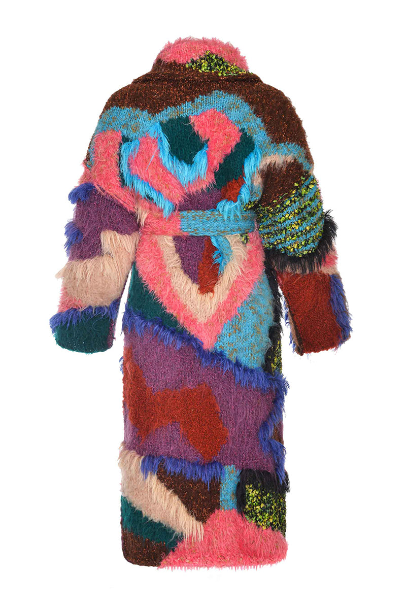 Lalo pink landscape mohair coat displayed on a hanger, showcasing its soft texture and stylish design.