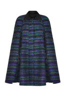 Lalo COOL BLUE wool cape coat draped over a mannequin, showcasing its stylish design and cozy fabric.