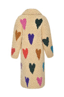 Lalo cream hearts wool coat with a tailored fit and button closure, featuring a classic design and soft fabric for cold weather.