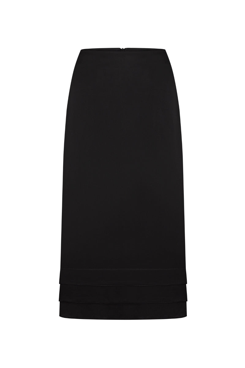 Black Shalivka midi skirt by Podyh, shown in a stylish, flowing fabric with a fitted waist and elegant length.
