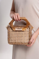 Mara Brazil MURIA top handle bag in brown leather with sleek design and sturdy handles, perfect for stylish everyday use.