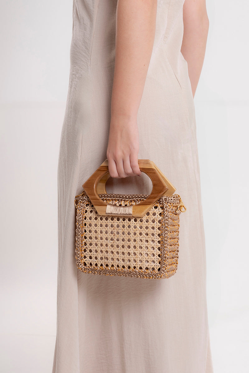 Mara Brazil MURIA top handle bag in beige with sleek design and gold-tone hardware, featuring a structured shape and stylish leather finish.