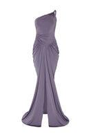Studio NK violet gown featuring elegant fabric and a flowing design, perfect for formal occasions.