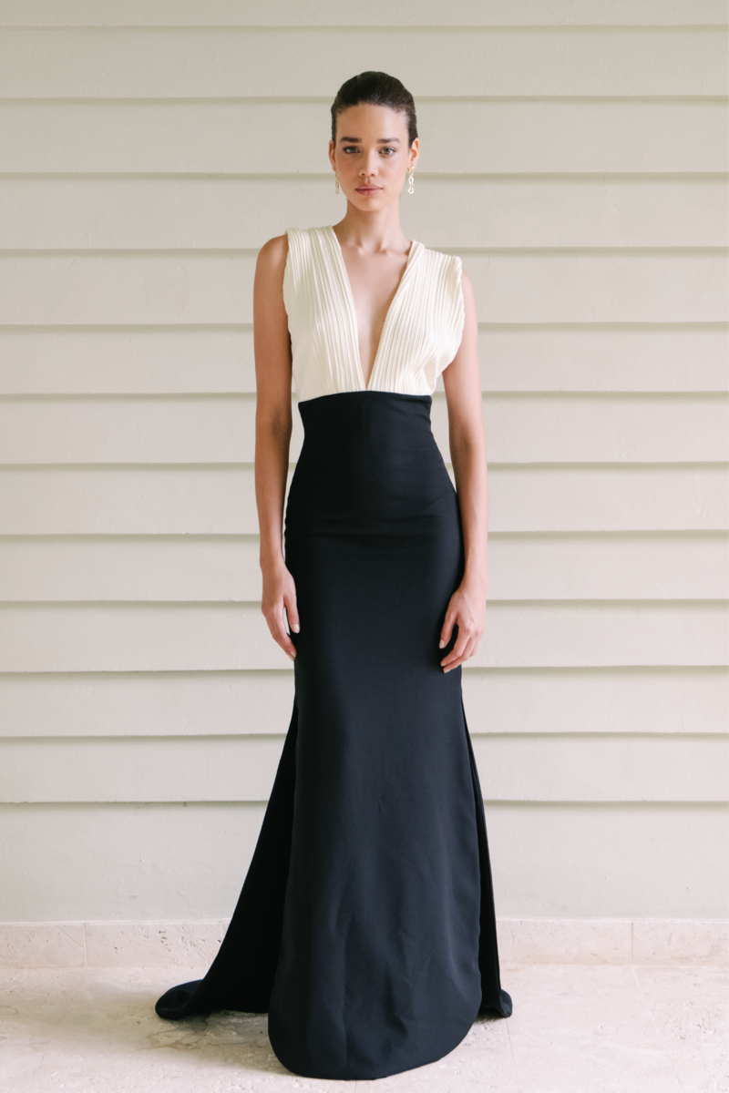 Maylé Vásquez Chavon black and white gown, elegant dress with a fitted bodice and flowing skirt, perfect for formal occasions