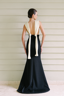 Maylé Vásquez Chavon black and white gown featuring elegant design, flowing fabric, and sophisticated style.