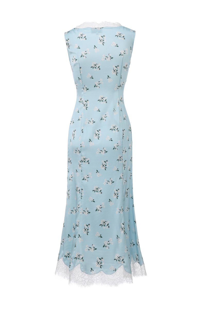 Chictopia floral slip midi dress with thin shoulder straps and a flowy, patterned fabric perfect for summer wear.