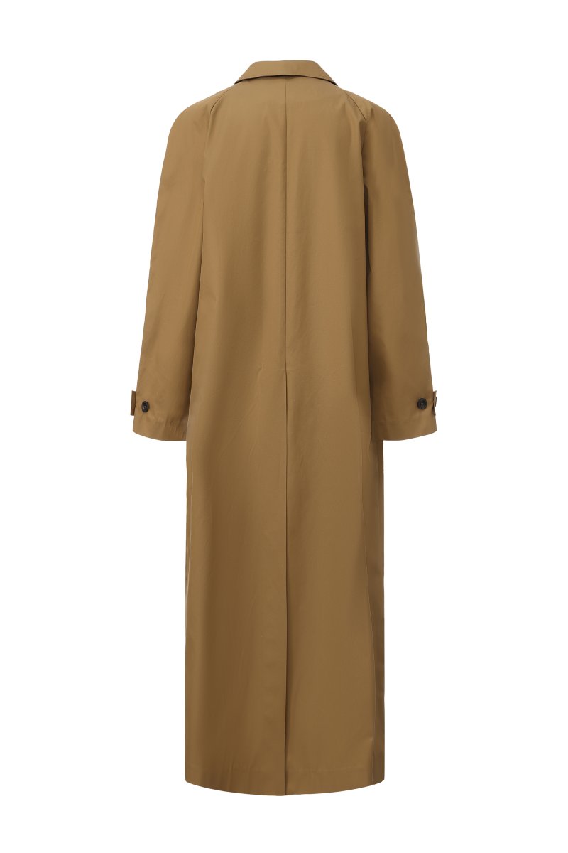 Long brown trench coat with a collar from Chictopia, shown on a model, featuring classic design and stylish details.