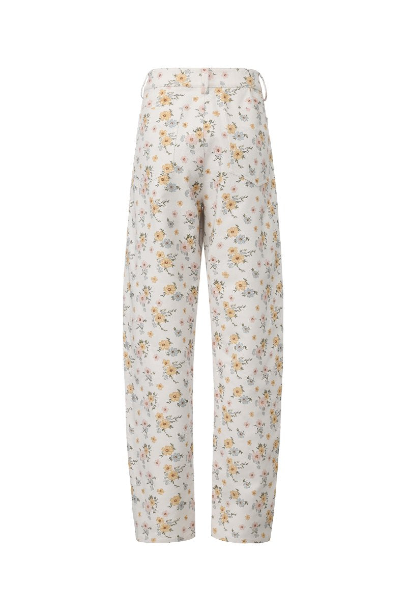 Pair of floral jeans by Chictopia featuring colorful floral embroidery and slim fit design displayed on a model.