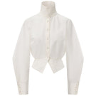 Chictopia sculpted waist shirt displayed on a hanger, showcasing fitted design and structured tailoring.