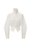Chictopia sculpted waist shirt displayed on a hanger, showcasing fitted design and structured tailoring.