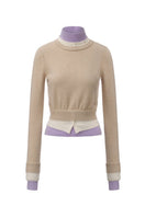 Beige layered cashmere sweater from Chictopia, featuring a cozy, stylish design with a soft texture and relaxed fit.
