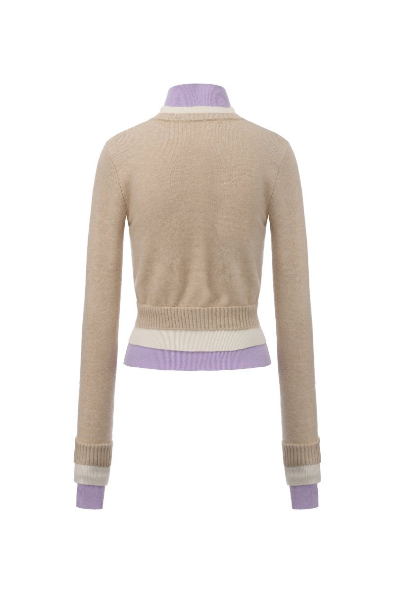 Beige layered cashmere sweater by Chictopia, showcasing soft fabric and stylish design on a model.