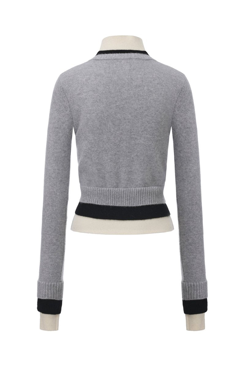 Chictopia layered grey cashmere sweater, soft and cozy with a stylish draped design, perfect for casual wear.