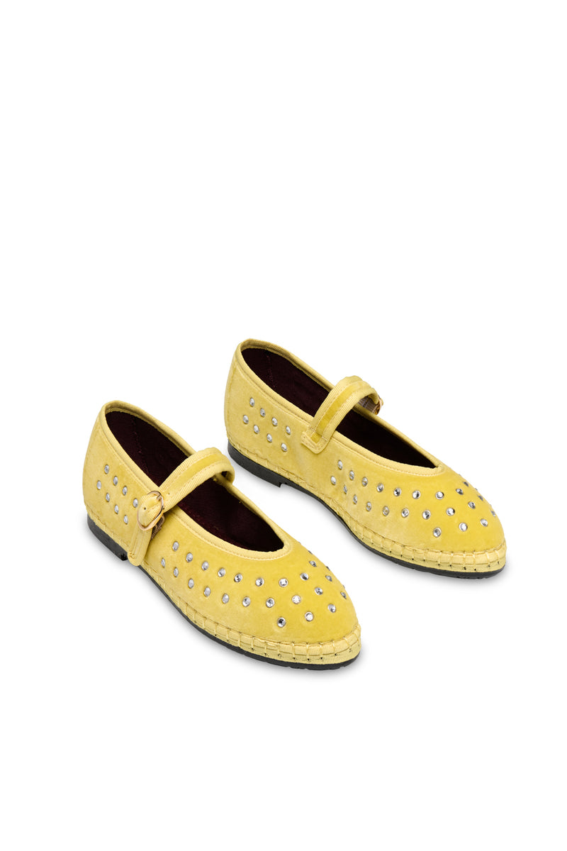 Flabelus Mae Cristal yellow flats with matching yellow piping, showcasing a stylish and comfortable footwear design.