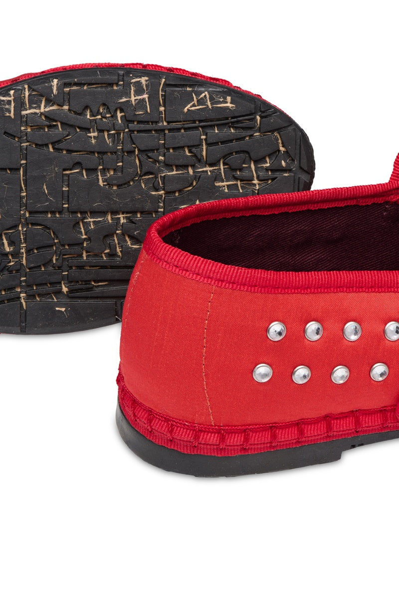 Flabelus Mae red flats with pointed toe and slip-on design, made of smooth material, showcasing stylish casual footwear.