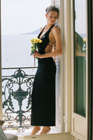 Black Maeve Maxi Dress by Nana Jacqueline featuring a stylish cowl neck, elegant design, and flowing fabric.