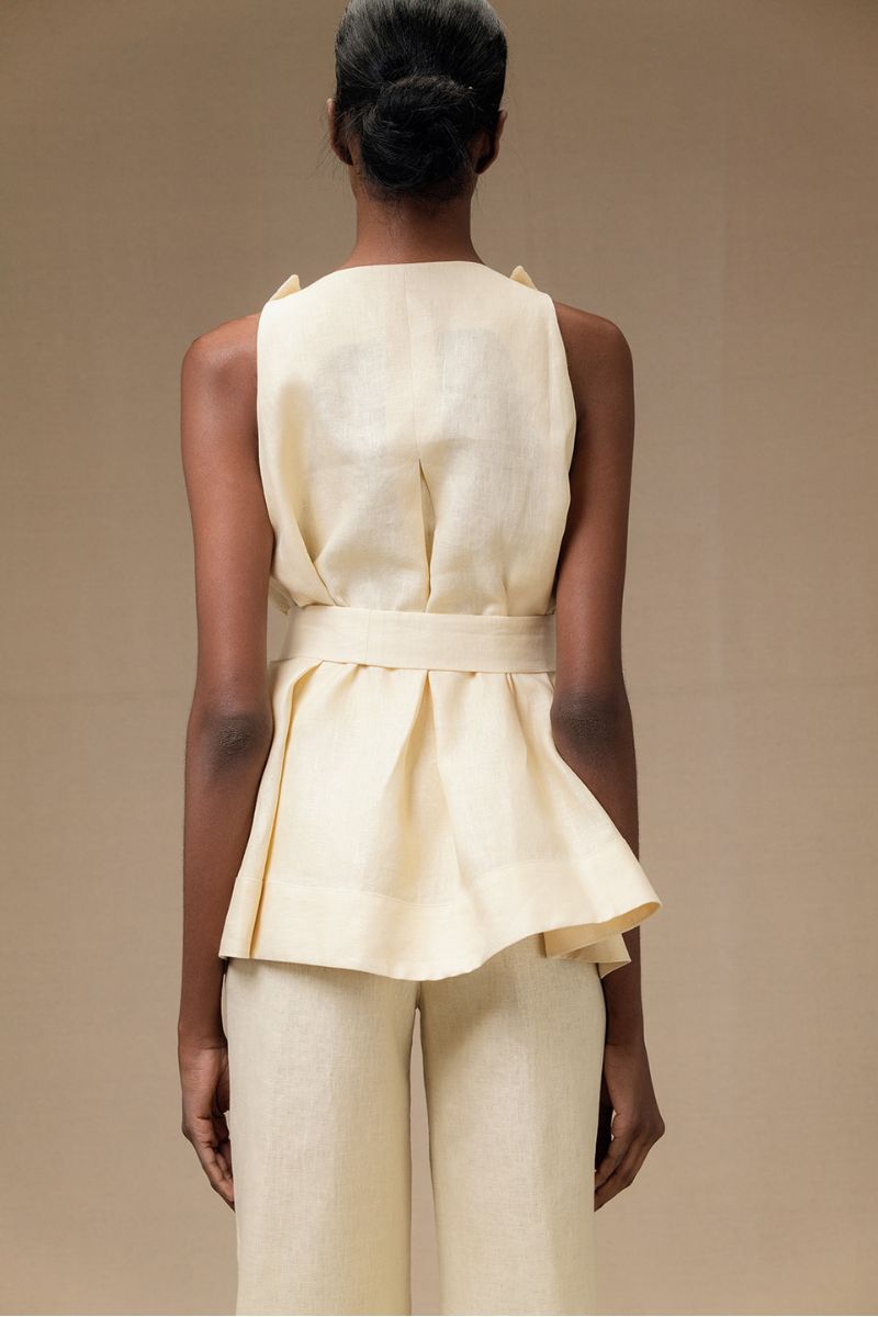 Butter yellow Magnolia blouse by Ana + Maria, featuring a stylish top with a relaxed fit and elegant design.