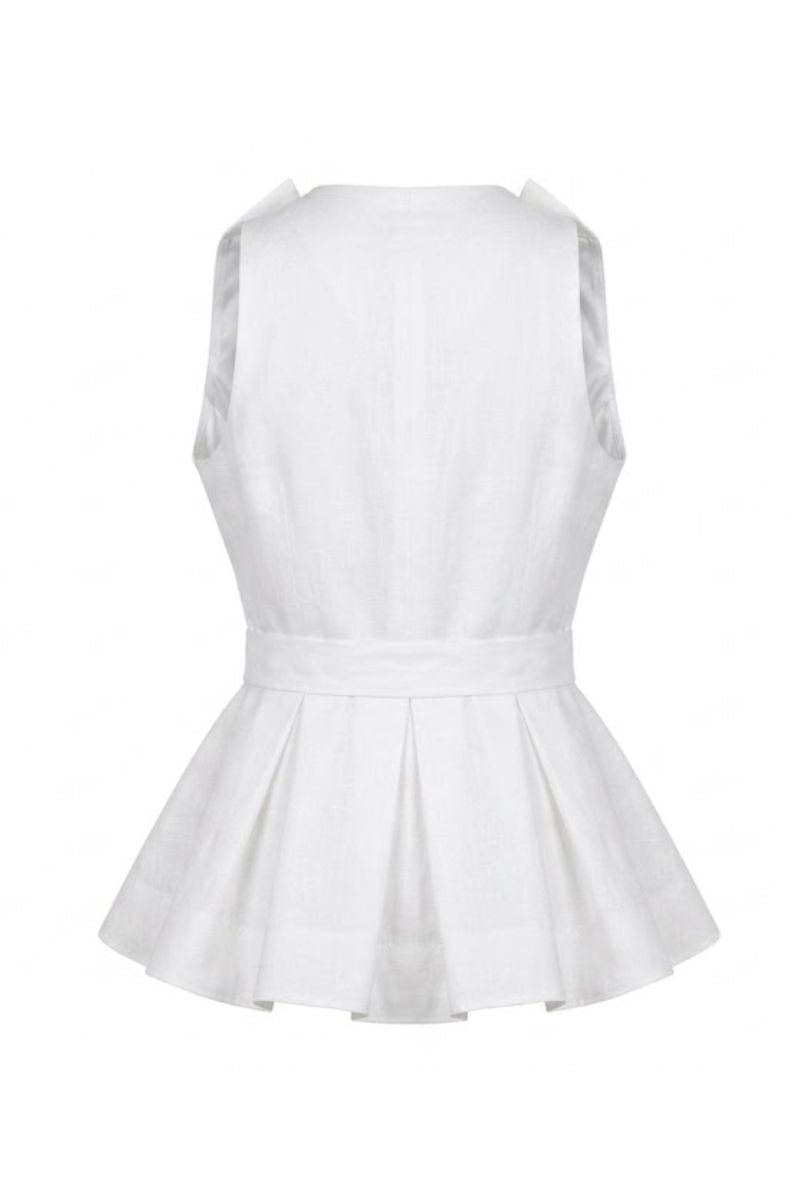 White Magnolia blouse by ANA + MARIA displayed on a ghost mannequin, showcasing the lightweight, flowy fabric and stylish fit.