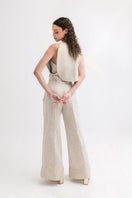 ANA + MARIA Malie Bib in Sand, a stylish sand-colored top with a relaxed fit and modern design.