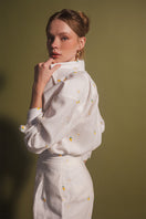 Ivory mango button-down shirt by Estefania, featuring a classic fit with crisp fabric and stylish collar detail.