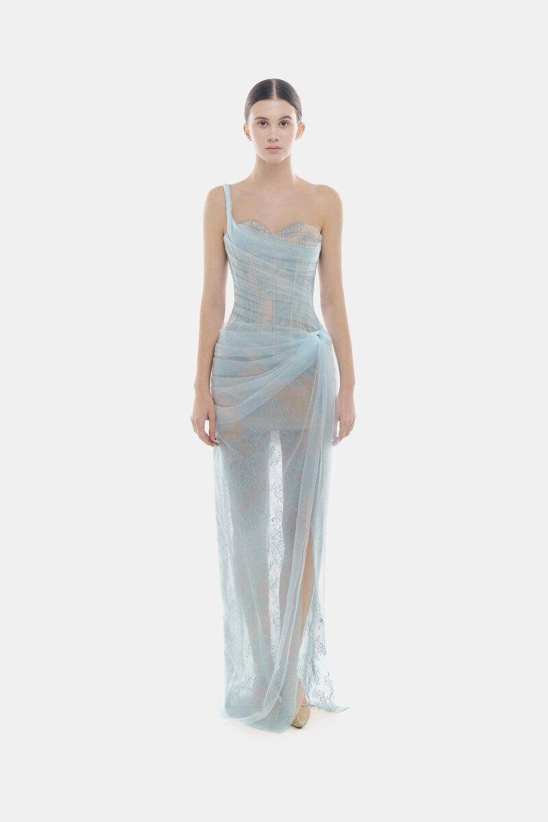 Blue Mara dress by Montsand, elegant gown featuring flowing fabric and stylish design, shown on a model.