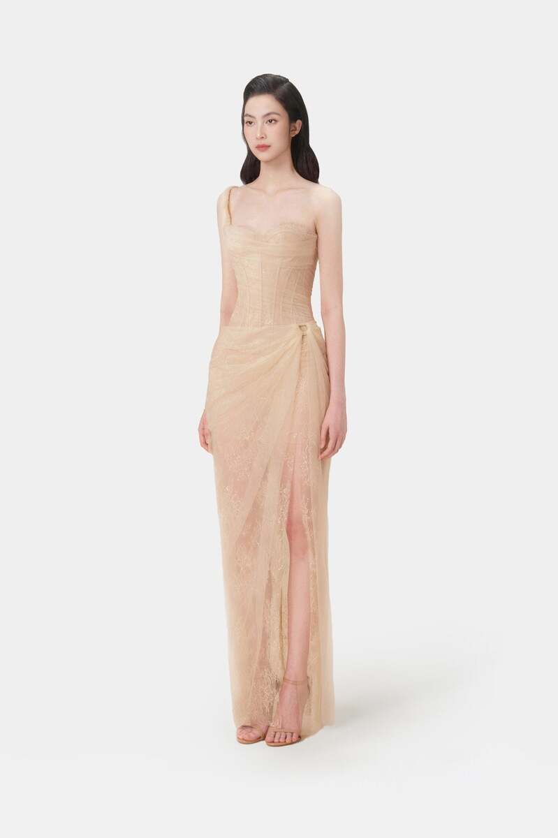 Pink Mara dress by Montsand, elegant gown with flowing fabric and a fitted bodice, perfect for formal occasions.