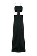 Black Mara Jersey Dress by Lorena Saravia, a flowing maxi dress with a sleek silhouette and elegant design.