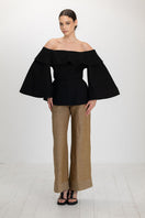 Black Ana + Maria Marena blouse, stylish women's top with long sleeves and a relaxed fit, displayed on a mannequin.