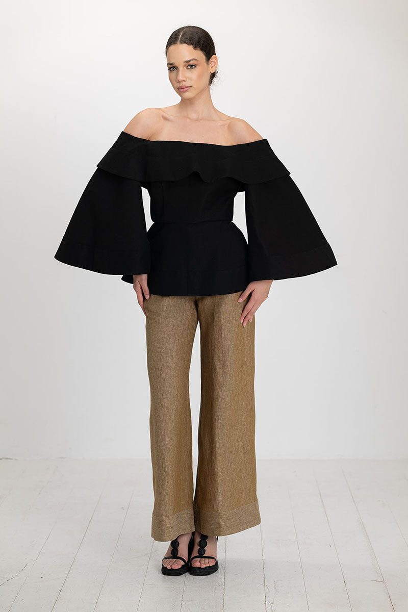 Black Ana + Maria Marena blouse, stylish women's top with long sleeves and a relaxed fit, displayed on a mannequin.