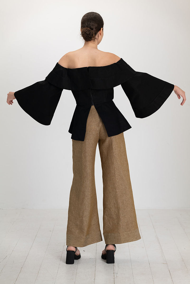 Black Marena blouse by ANA + MARIA, stylish top with a relaxed fit, displayed on a white background.