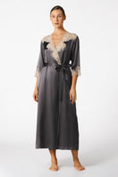 NK IMODE Margaux sophisticated long silk robe in wet sand color, featuring elegant, flowing design and luxurious fabric.
