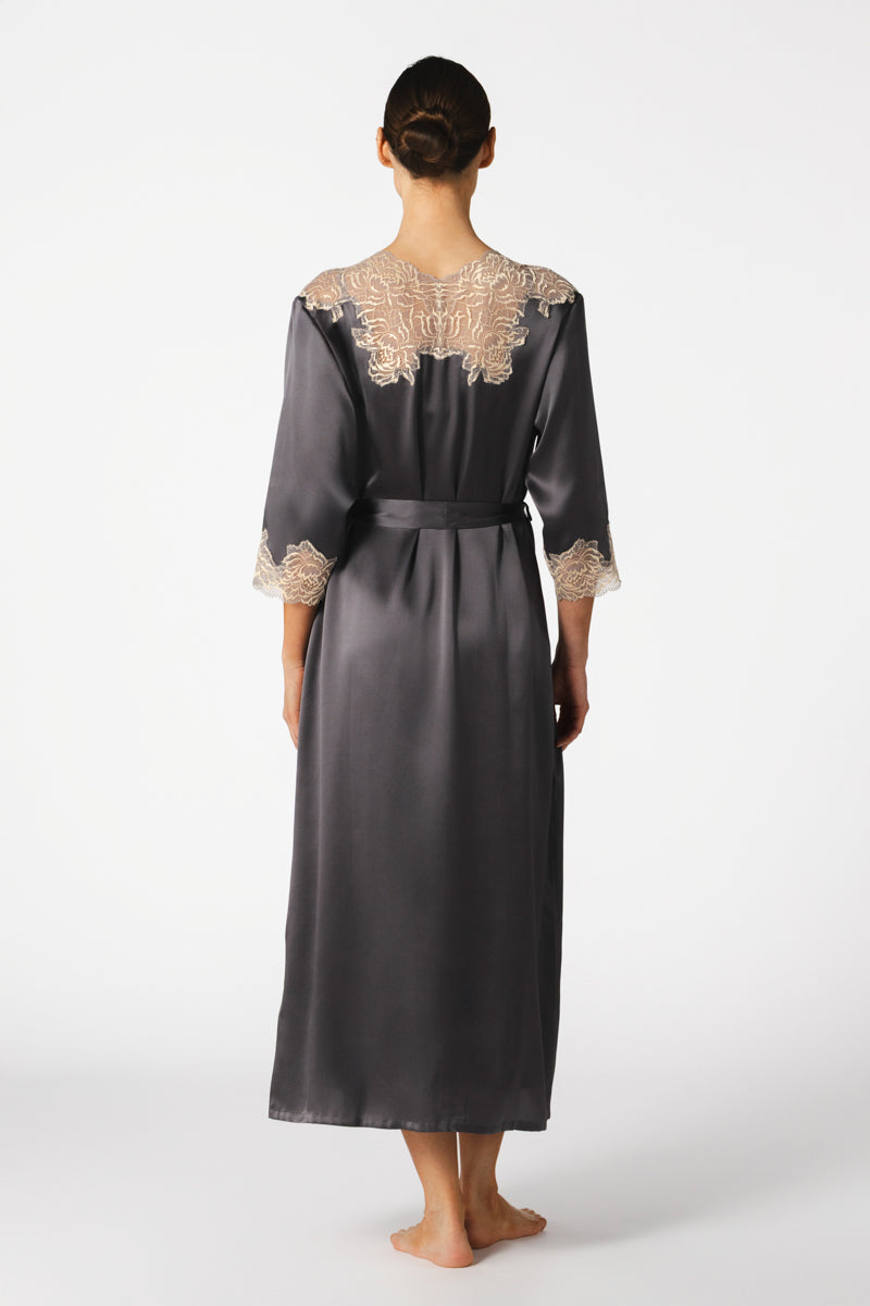 Elegant NK IMODE MARGAUX long silk robe in wet sand color, featuring a sophisticated, sensual design with smooth fabric and flowing silhouette.