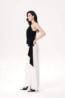 White Colette jeans by Nana Jacqueline, showcasing a stylish pair of high-waisted denim pants with a modern fit.