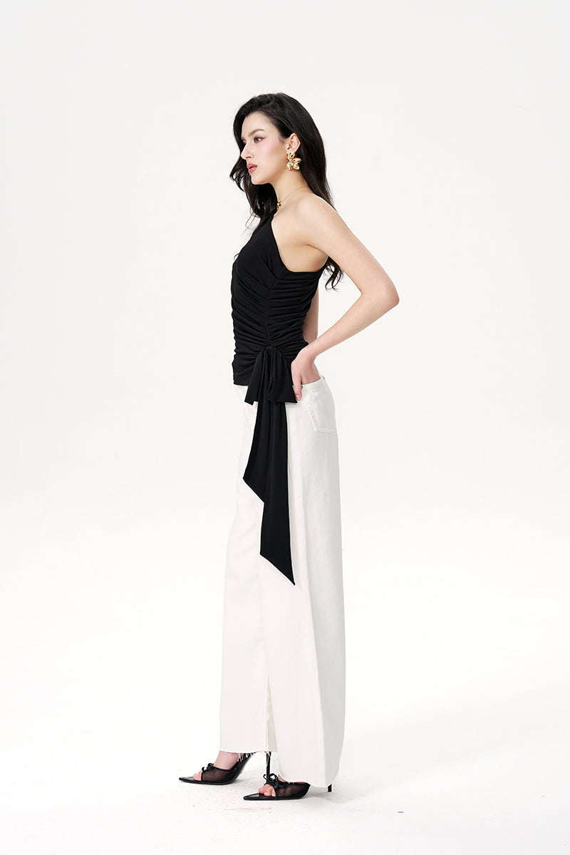 White Colette jeans by Nana Jacqueline, showcasing a stylish pair of high-waisted denim pants with a modern fit.