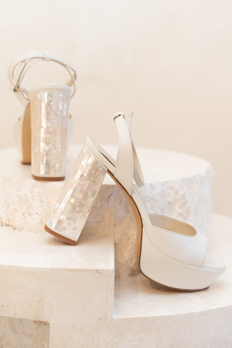 Ivory leather Margot pearl heels by Freya Rose with block heels and elegant pearl embellishments.