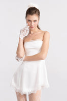 White satin Marilyn mini dress by Nana Jacqueline, featuring a fitted silhouette and stylish design for elegant occasions.
