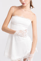 White Marilyn satin mini dress by Nana Jacqueline, featuring a sleek, fitted silhouette and elegant satin fabric.
