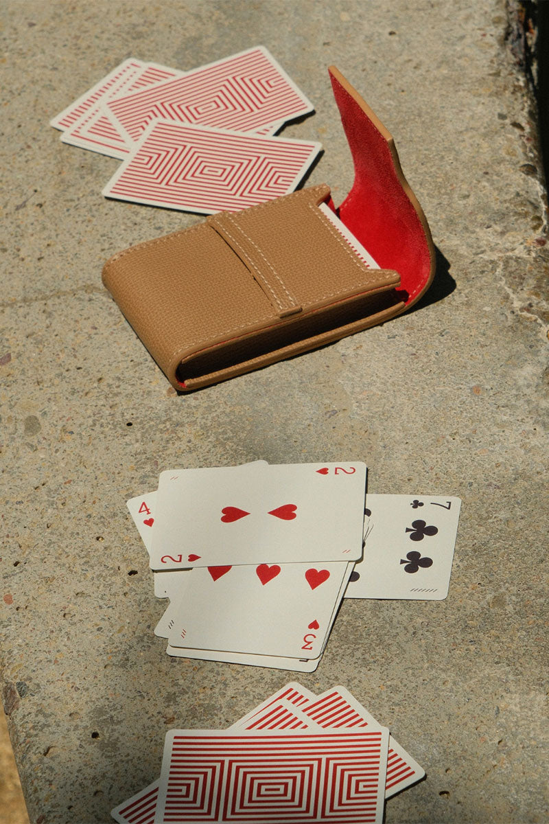 Leather playing card set in Marrakesh style by Throwing Doubles, featuring intricately designed cards on a vibrant background.