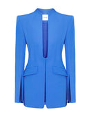 Blue Marseille jacket by LEKIEU, featuring a stylish and comfortable design, shown hanging on a clothing rack.