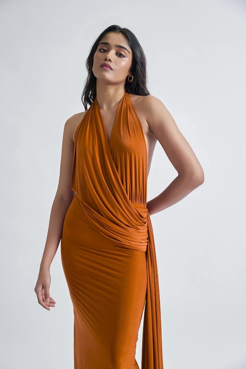 Deme by Gabriella Martina maxi dress featuring a flowy silhouette, floral pattern, and elegant design perfect for summer wear.