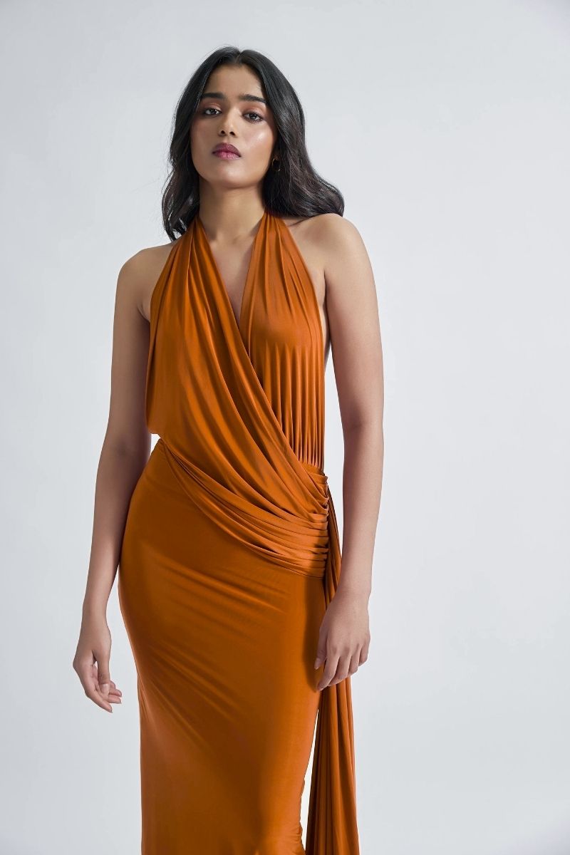 Deme by Gabriella Martina maxi dress featuring a flowing fabric, elegant design, and vibrant pattern for stylish summer wear.
