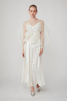 Mastani Arini embellished pearl maxi dress with intricate embroidery and flowing fabric, perfect for elegant occasions.