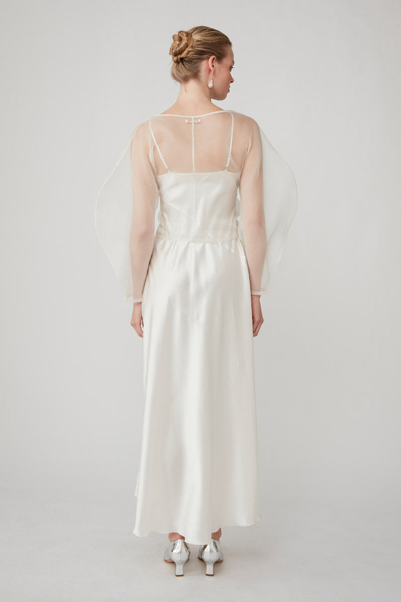 Elegant maxi dress by Mastani with pearl embellishments and an organza wrap top, perfect for formal occasions.