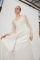 Mastani Roohi organza wrap top in pearl color, featuring delicate fabric and elegant design, displayed on a hanger.
