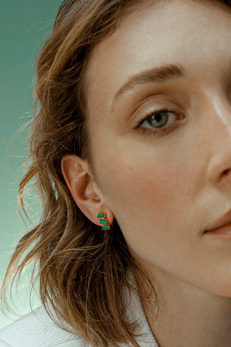 Gold Maya 3 stone studs earrings by Fenomena featuring three small, round gemstone accents in a classic earring design.